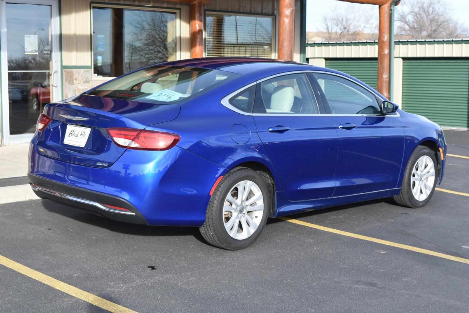 2016 Blue /Beige Chrysler 200 Limited (1C3CCCABXGN) with an 2.4L 4 Cyl Multiair engine, 9-Speed Automatic transmission, located at 1600 E Hwy 44, Rapid City, SD, 57703, (605) 716-7878, 44.070232, -103.171410 - Photo#7